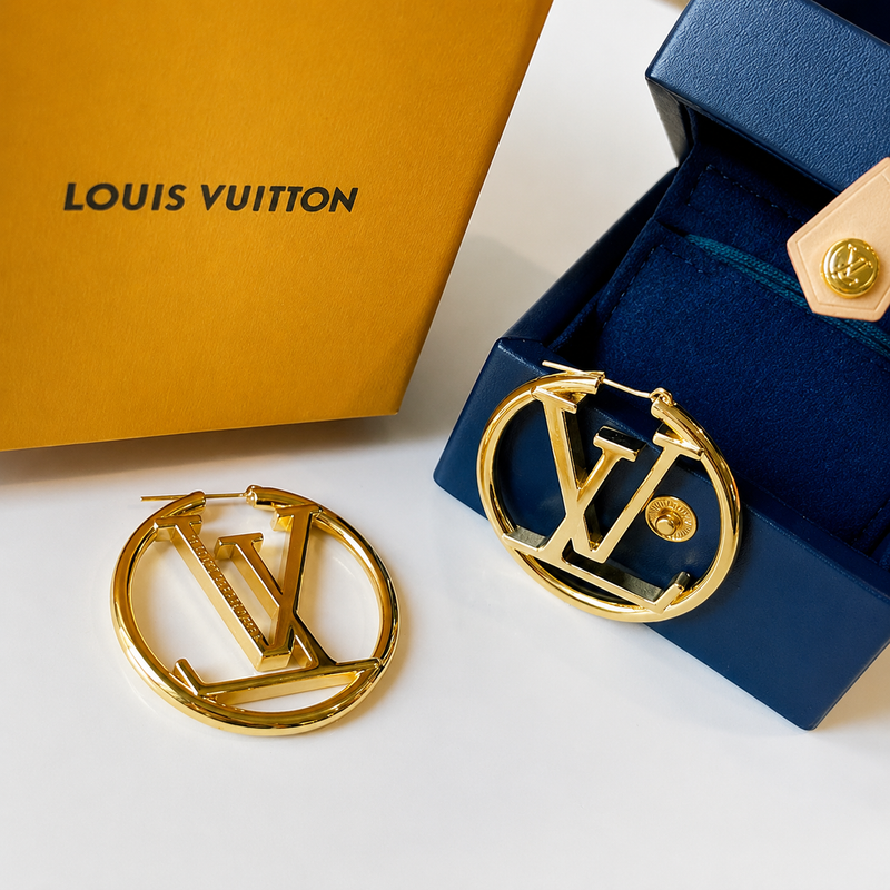 Inspired luxury gold hoop earrings with premium gift box on white background
